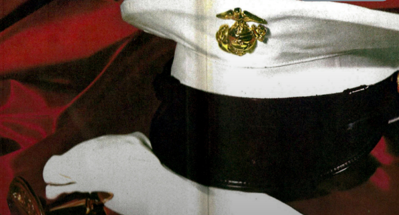 A Marine's dress uniform. Hat and gloves.