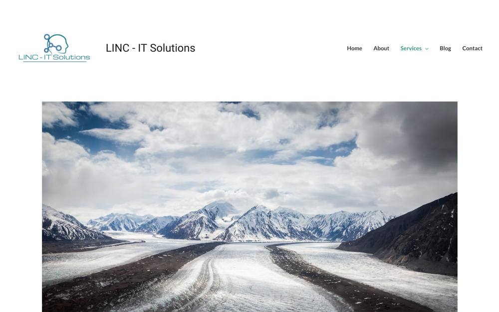 Distracting image from original site. Road heading into mountain range.