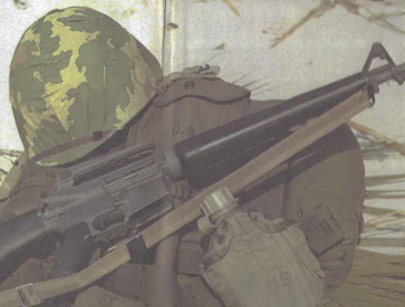 Soldier's gear. Helmet, uniform and gun.