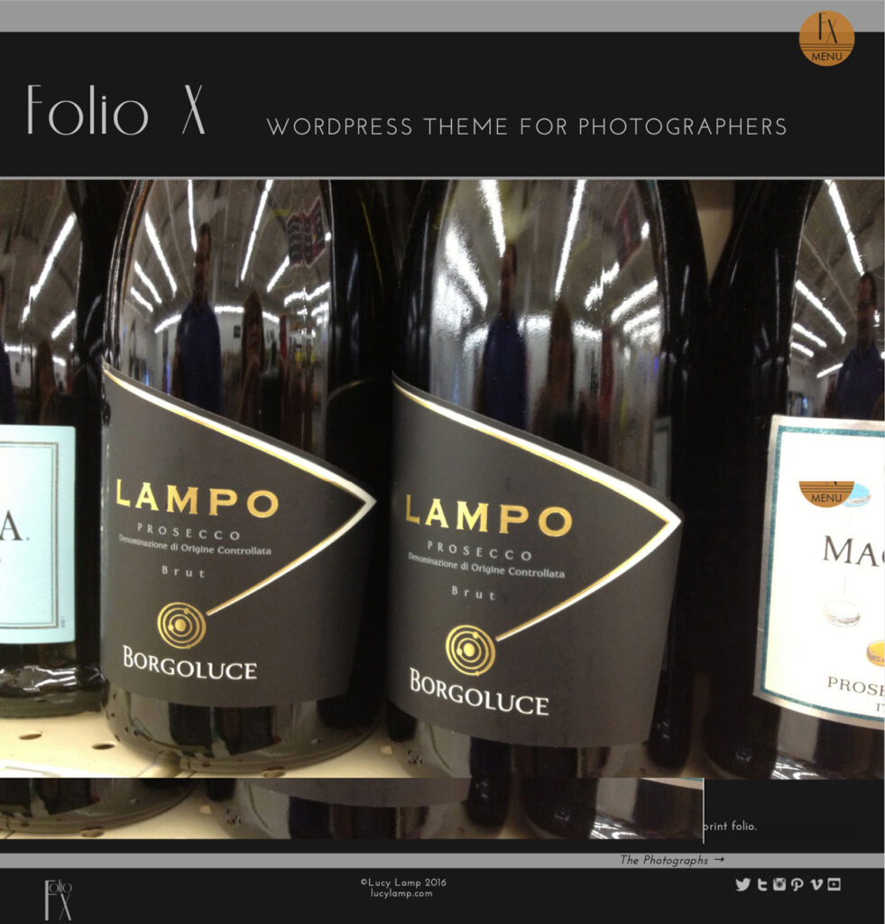 FolioX website home page. Close up image of Lampo brand Prosecco sparkling wine bottles on liquor store shelf.
